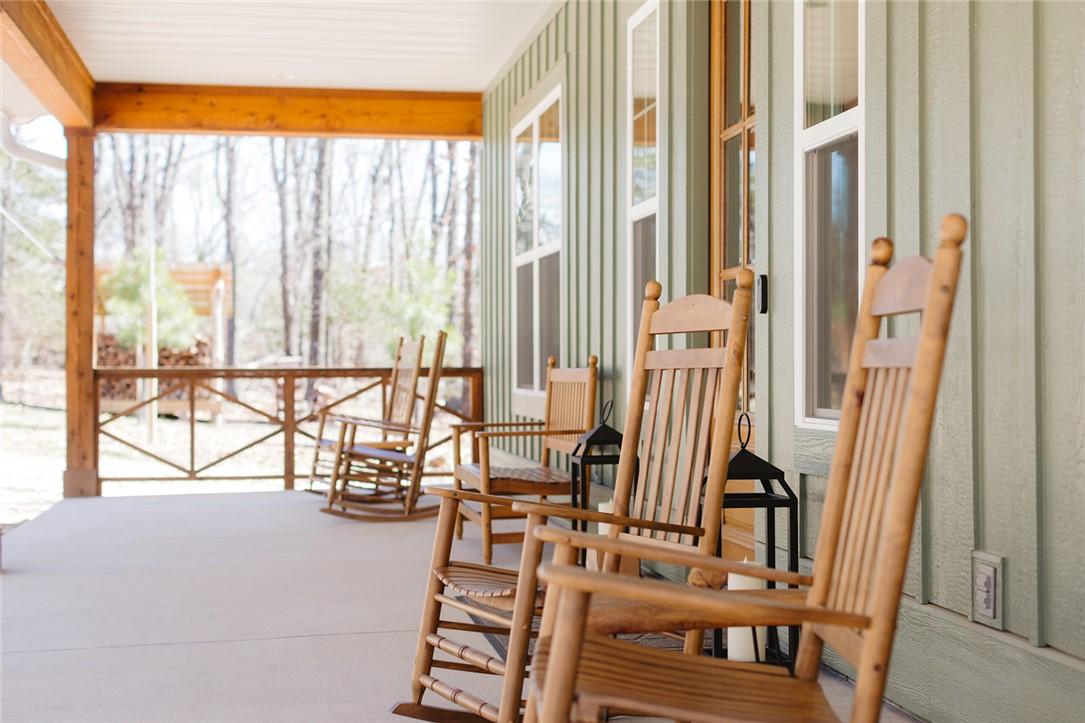 Image 4: Cedar trimmed covered front porch is 10.5 x 44 fee