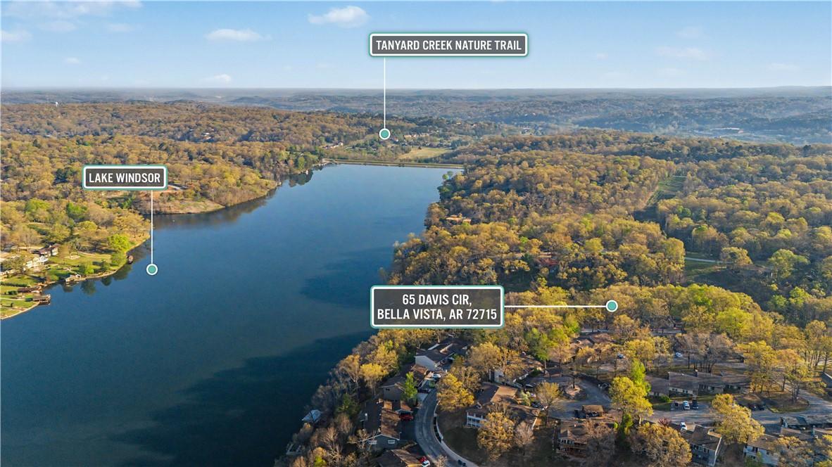 Image 2: Aerial view of property and surrounding area with