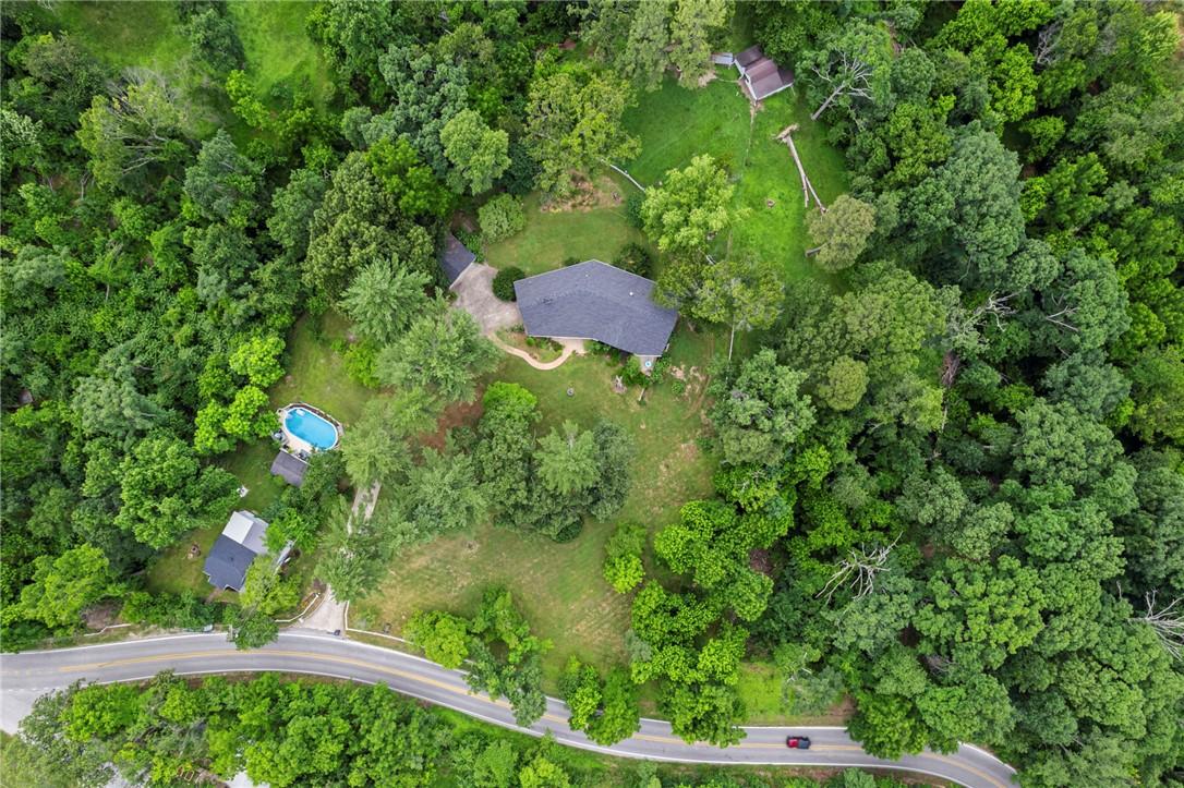 Image 3: Property featuring an above-ground pool, expansive