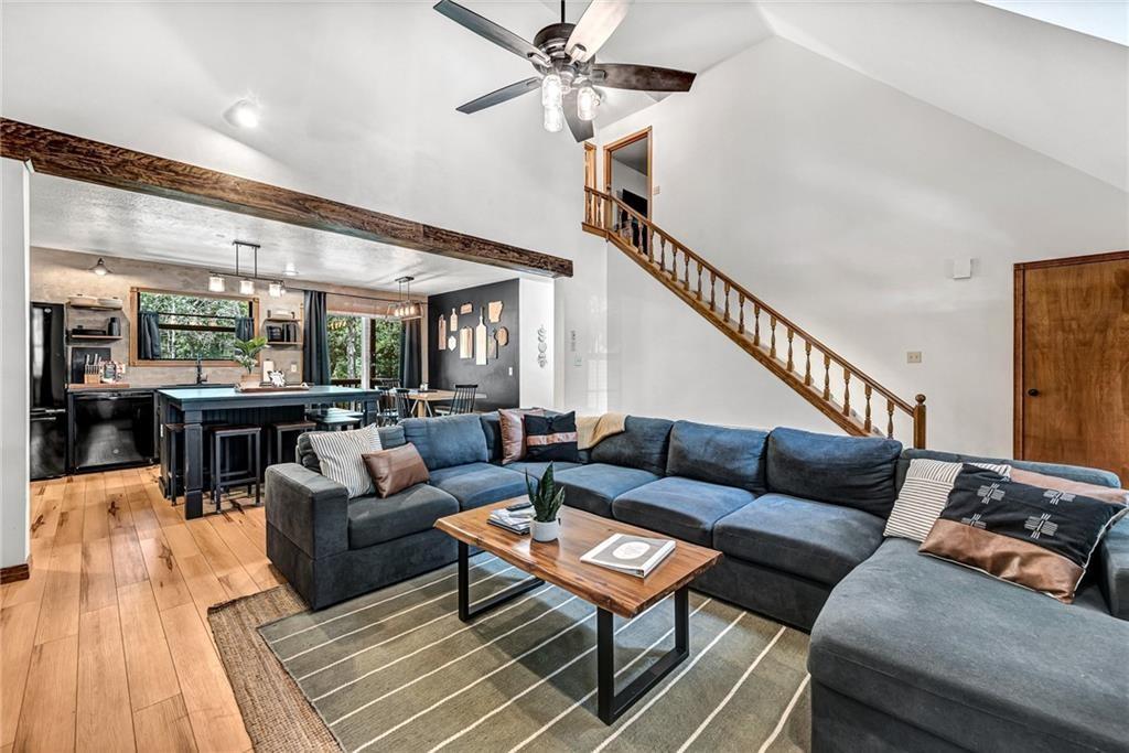 Image 4: Living area with hardwood