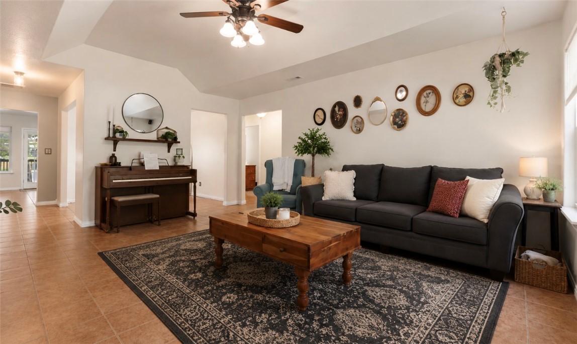 Image 4: Spacious living area featuring neutral wall tones,