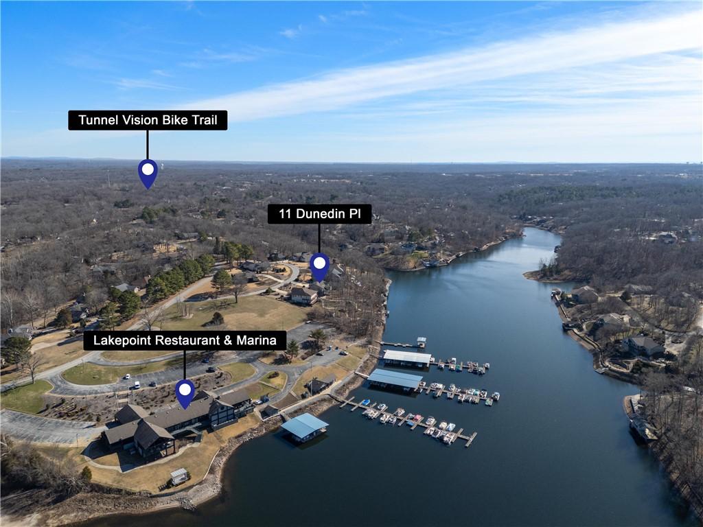 Image 3: Aerial view of property and surrounding area with