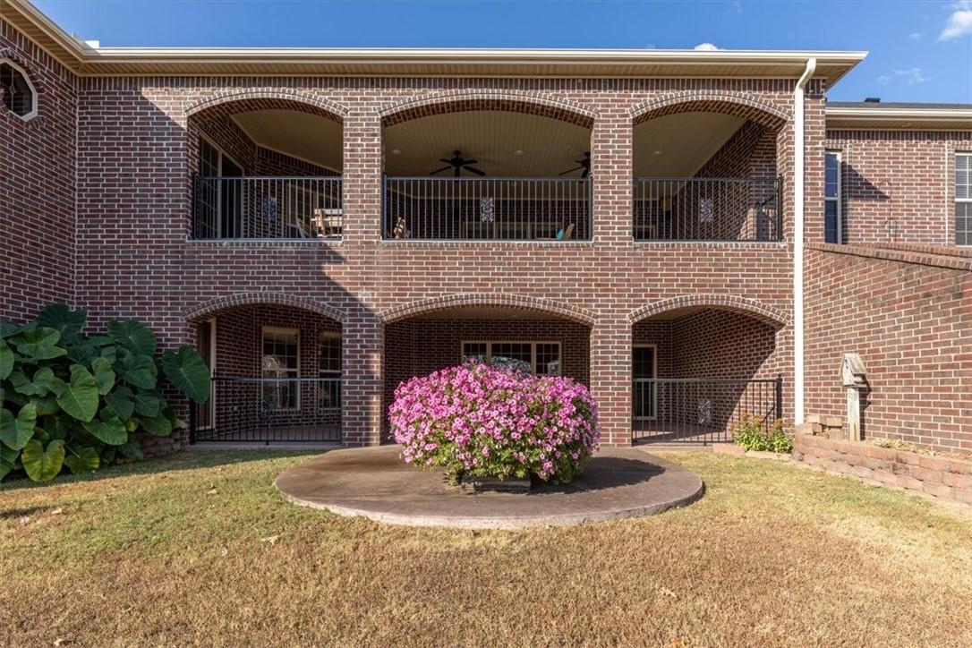 Image 2: Rear view of property with a verandas on two level