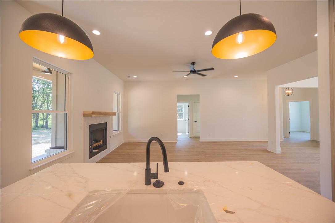 Image 4: Kitchen island featuring a single-basin sink with