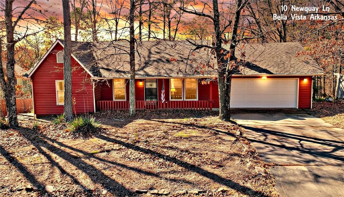 Image 1: View of front of home featuring concrete driveway,