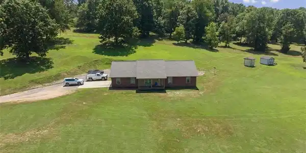 Image 2: all brick low maintenance home with 20 open acres
