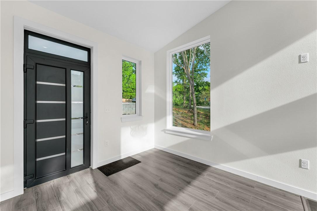Image 3: Modern black entry door with frosted glass panels