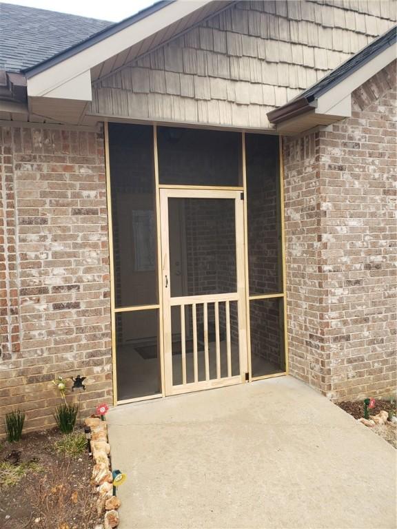 Image 4: Entrance to property  brick siding.