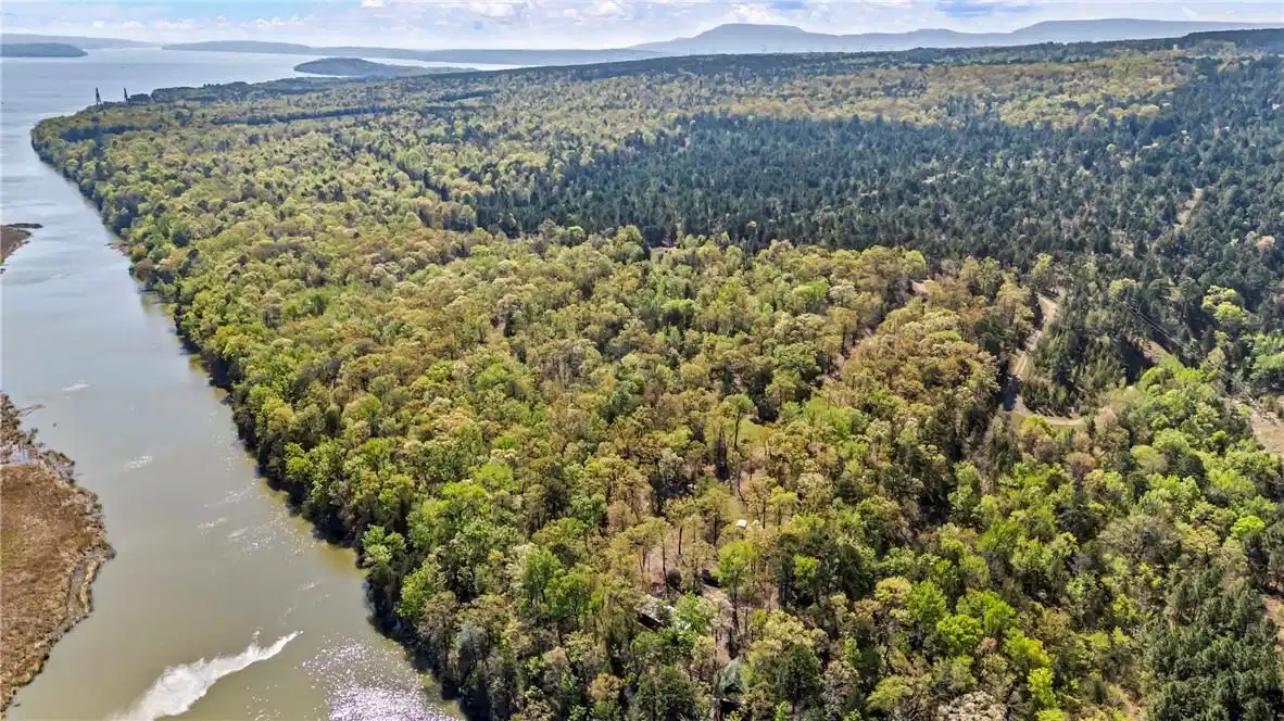 Image 1: Bird's eye view of a nearby body of water