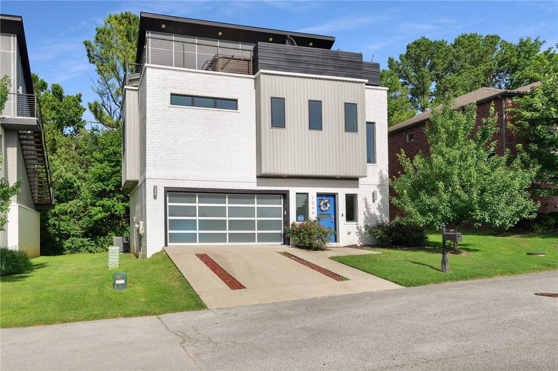 Image 2: Contemporary exterior with white painted brick and