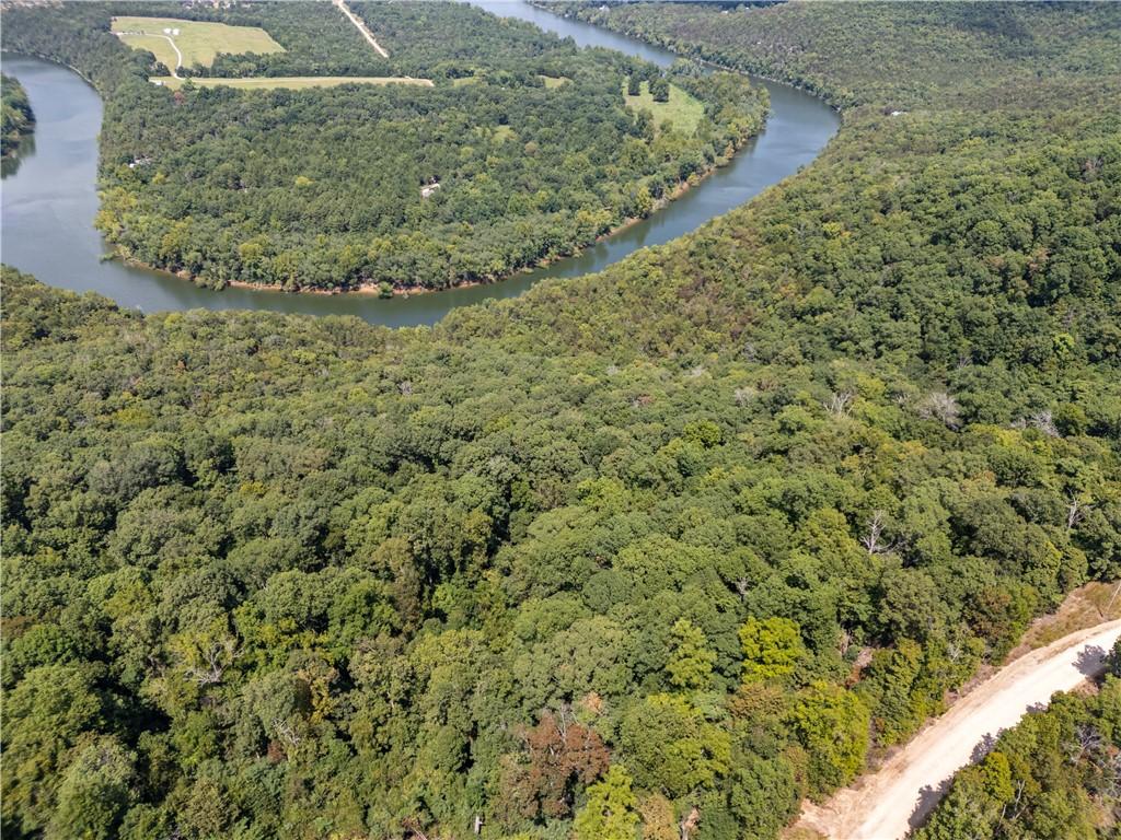 Image 4: Aerial overview of property's location with a heav