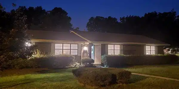 Image 3: Ranch-style house featuring a yard and brick sidin