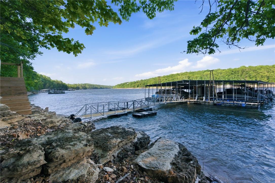 Image 2: private boat dock in Beaver Lake, covered boat sli