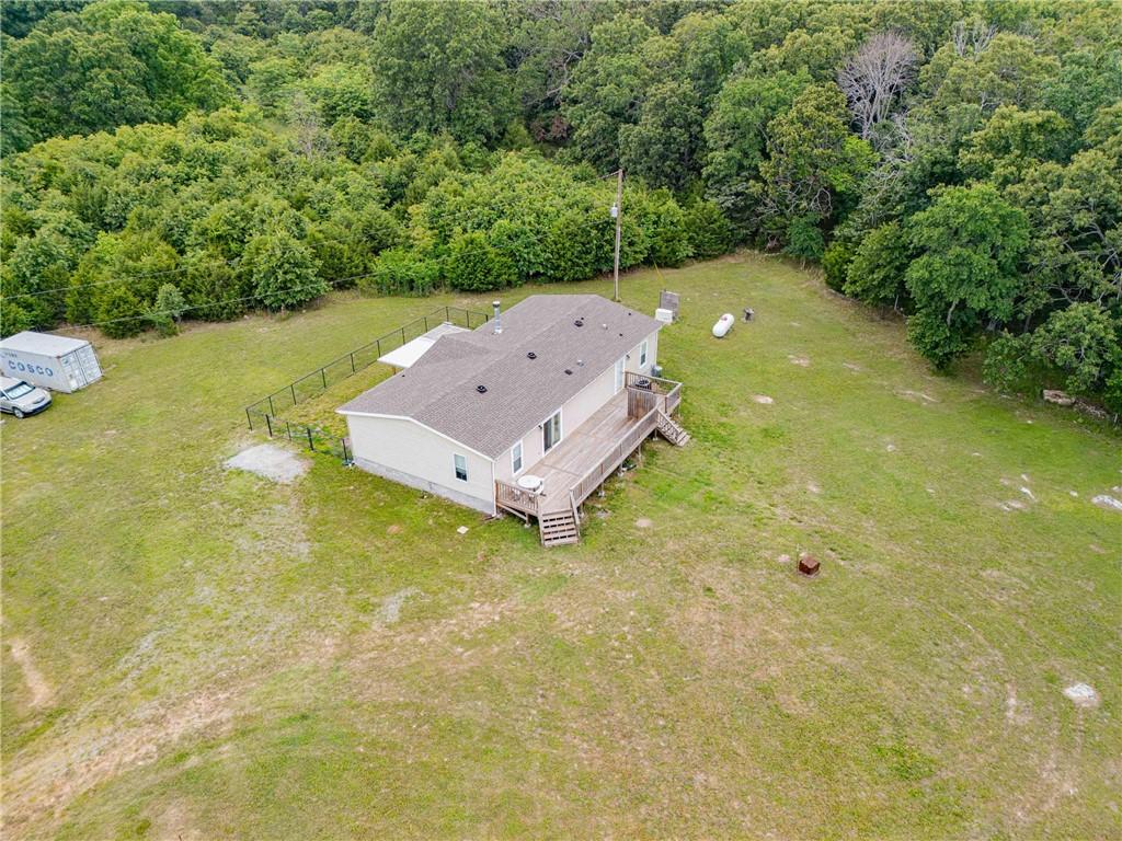 Image 4: Ranch-style residence featuring a light-colored ex