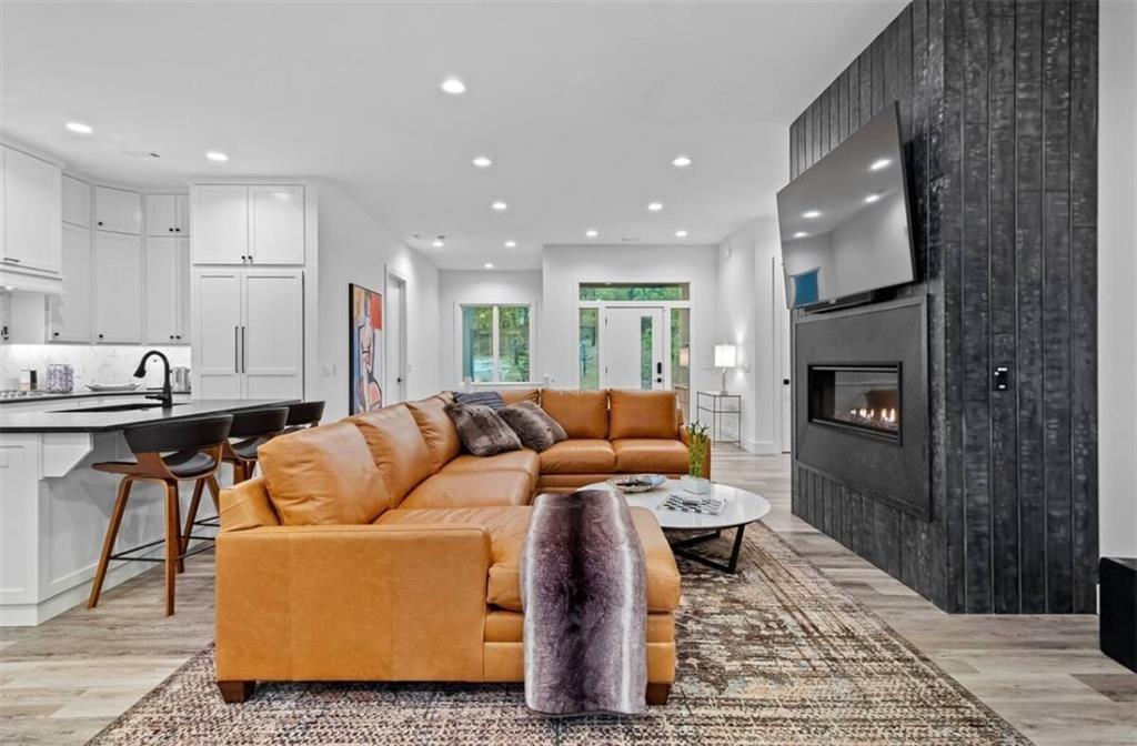 Image 3: Open living space with floor-to-ceiling Shou Sugi