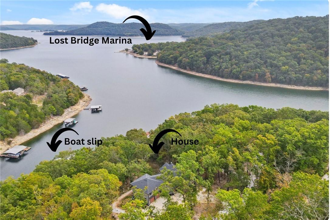 Image 4: Boat dock located in front of home plus a short ri