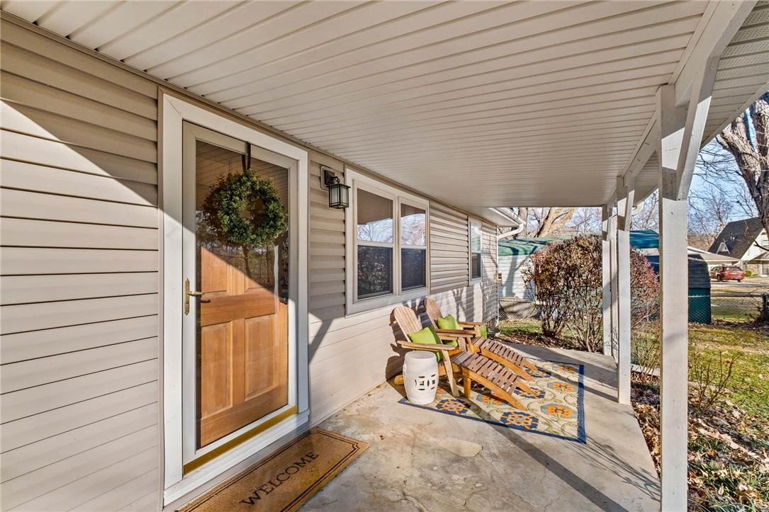 Image 2: Entrance to property with a covered front porch