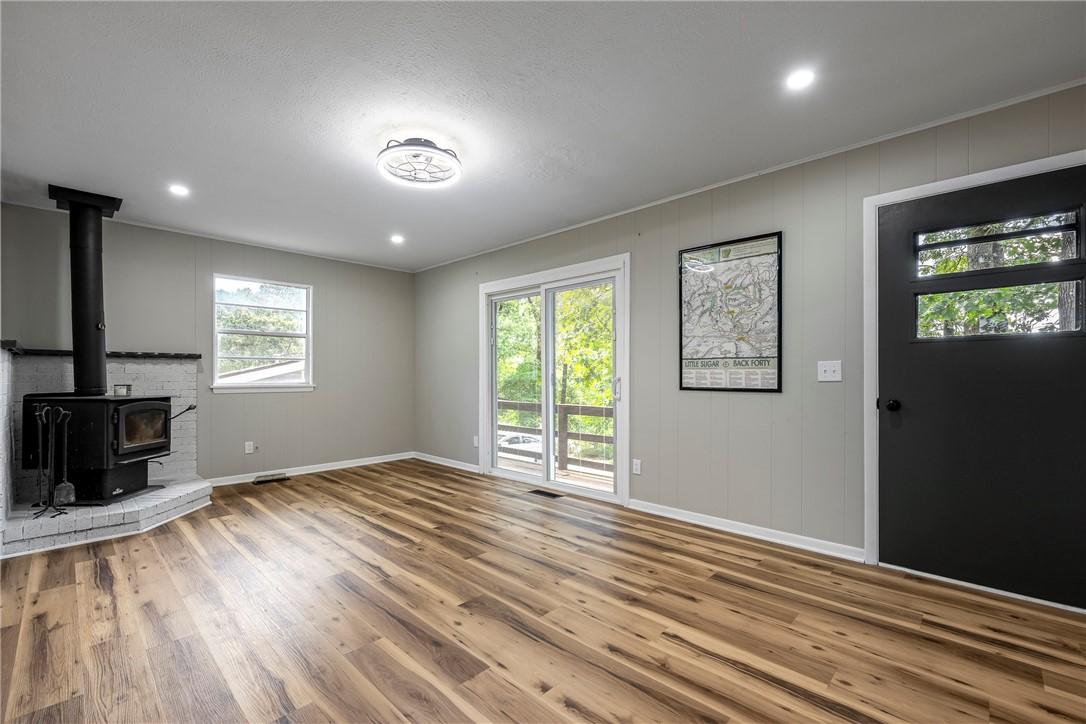 Image 1: Updated home with modern finishes.