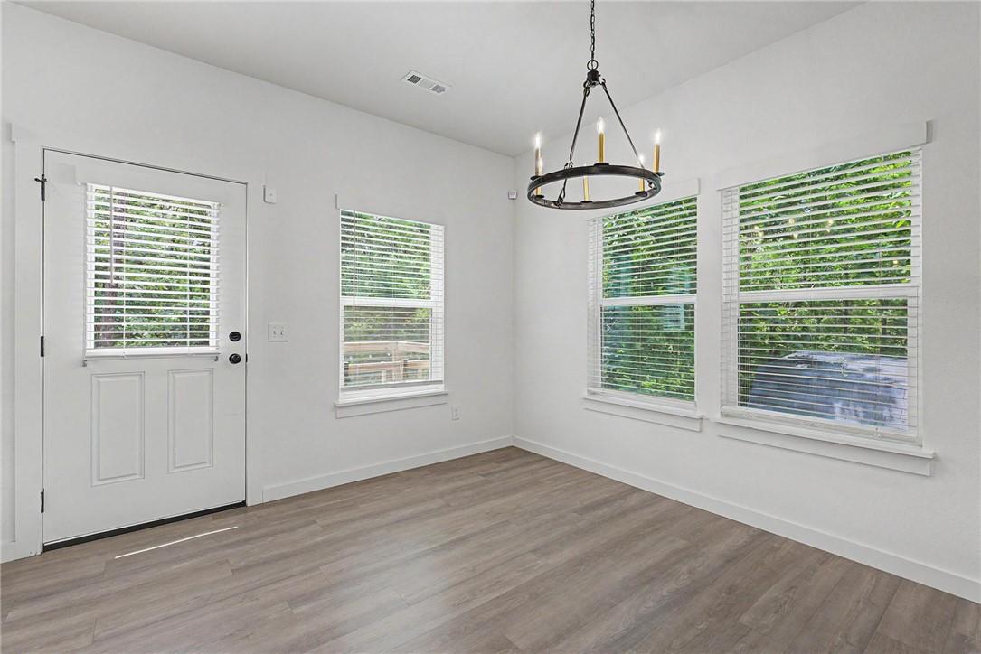 Image 4: Dining area with access to the back deck.