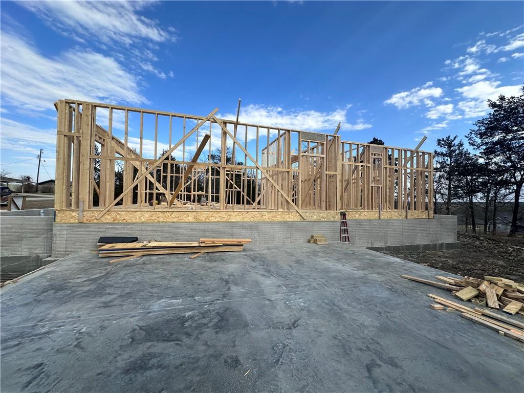 Image 4: View of side of house from garage.