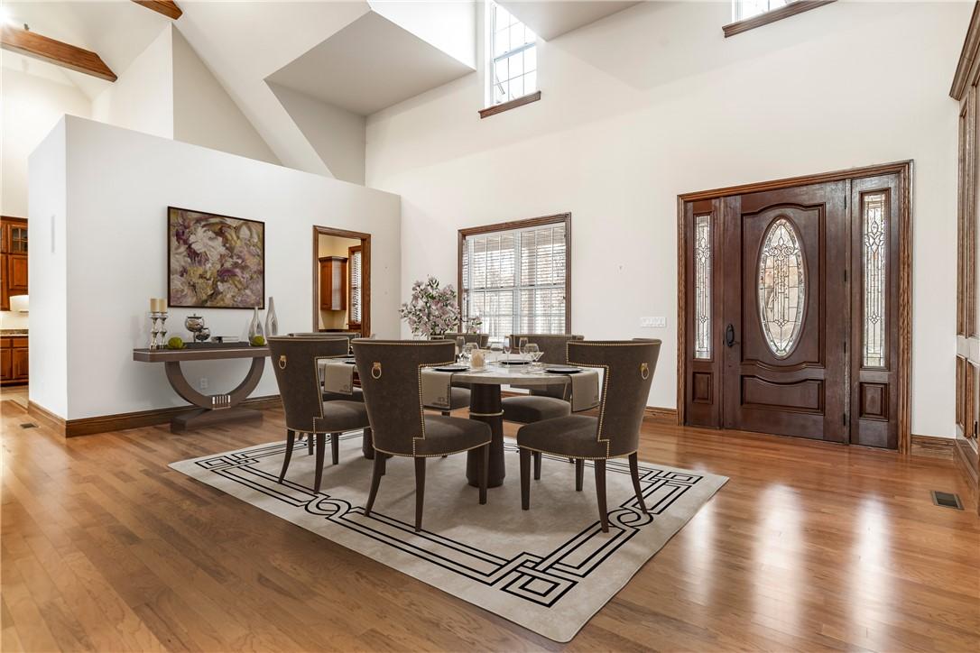 Image 4: Digitally stated Dining space featuring light wood
