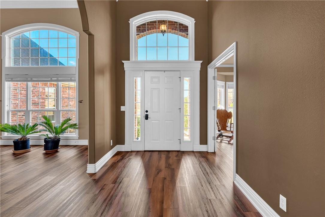 Image 4: Entrance foyer featuring dark wood-type flooring a