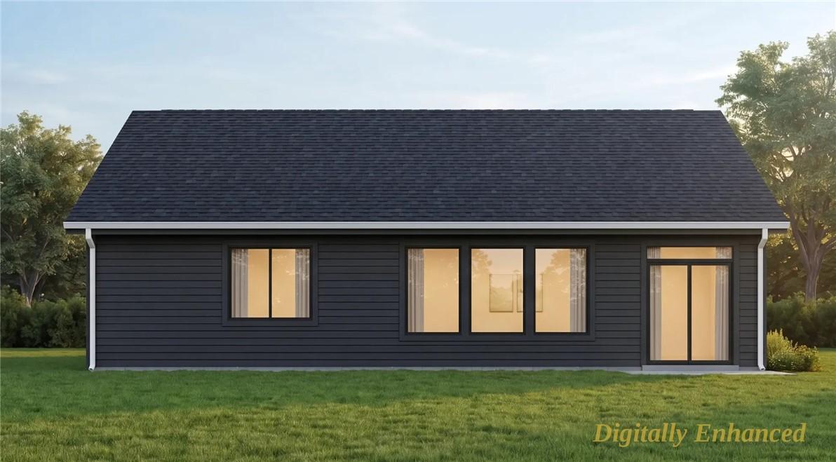 Image 2: Rear exterior featuring dark horizontal siding, a