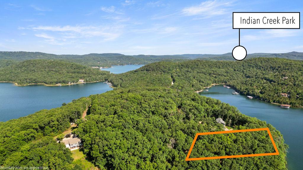 Image 4: Wooded lot with water frontage, offering substanti