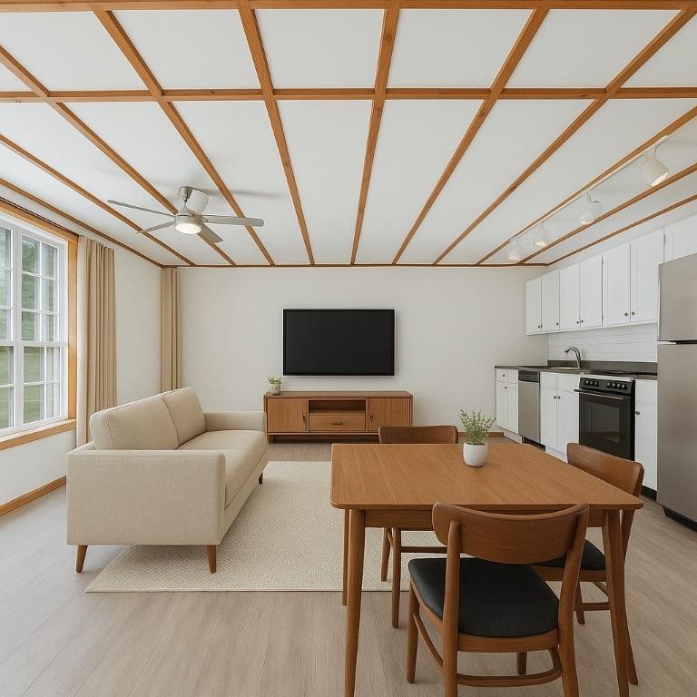 Image 3: Virtually staged living space and kitchen area.