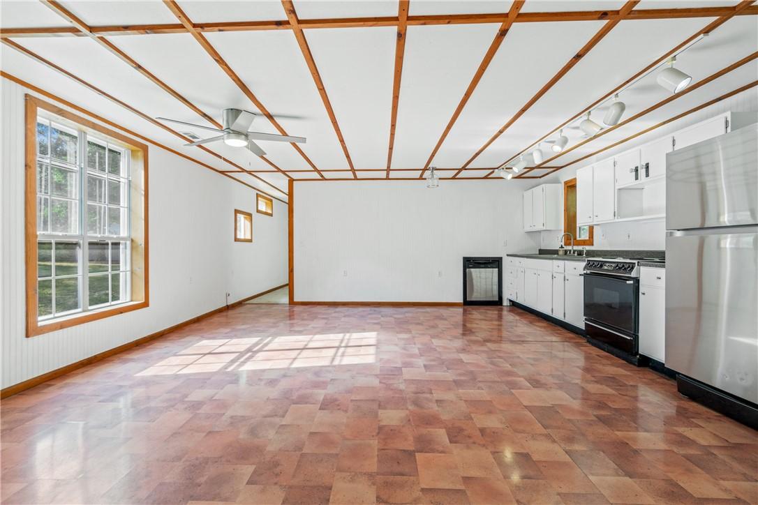 Image 4: Bright and welcoming with a touch of rustic charm&mdash;