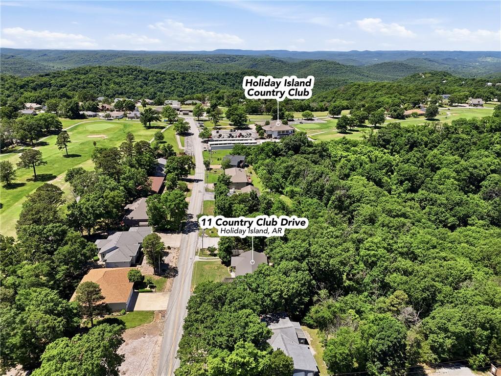 Image 2: Aerial perspective showcasing dense surrounding gr