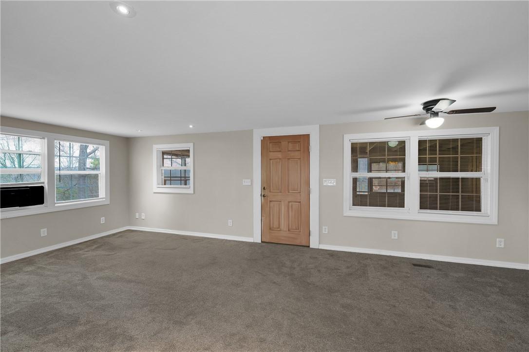 Image 3: Unfurnished living room with carpet floors, ceilin