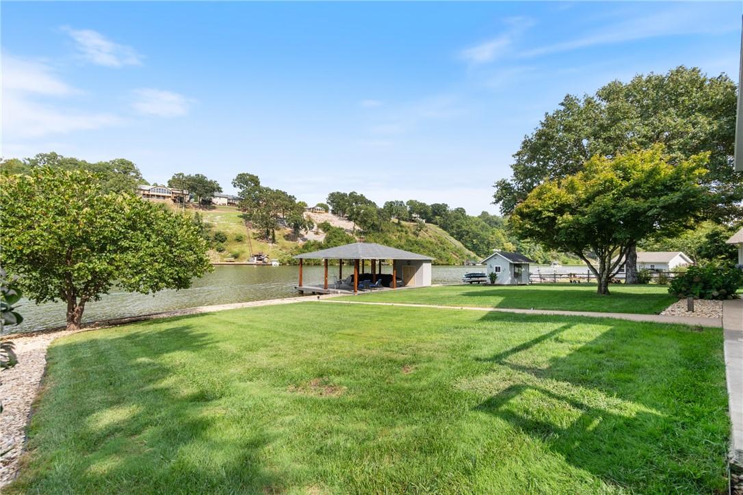 Image 2: A flat lot on ANY lake in NWA is rare.