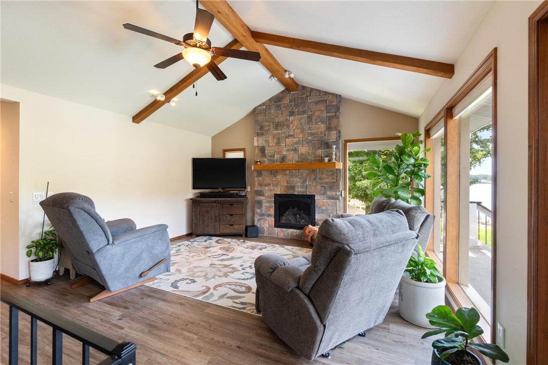 Image 4: Living room with vaulted ceilings.