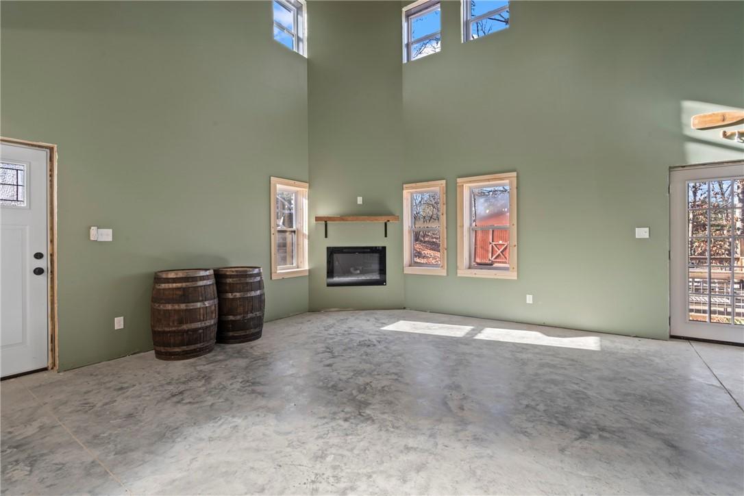 Image 4: Living area downstairs with plenty of natural ligh