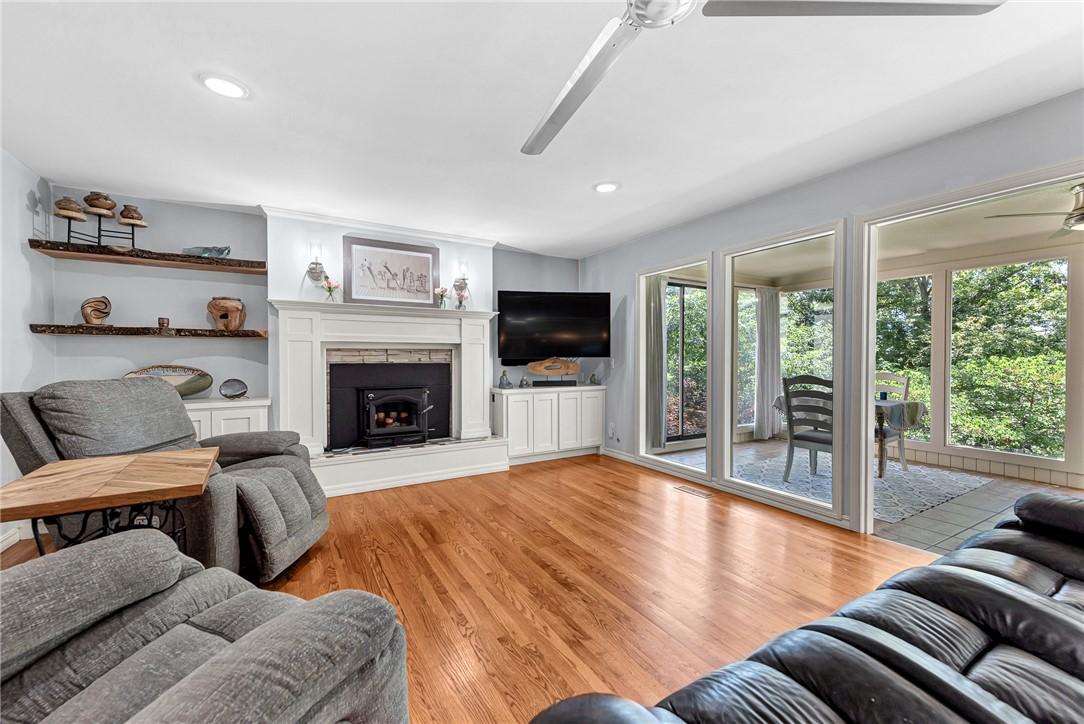 Image 3: Hardwood Floors and updated fireplace flow seamles