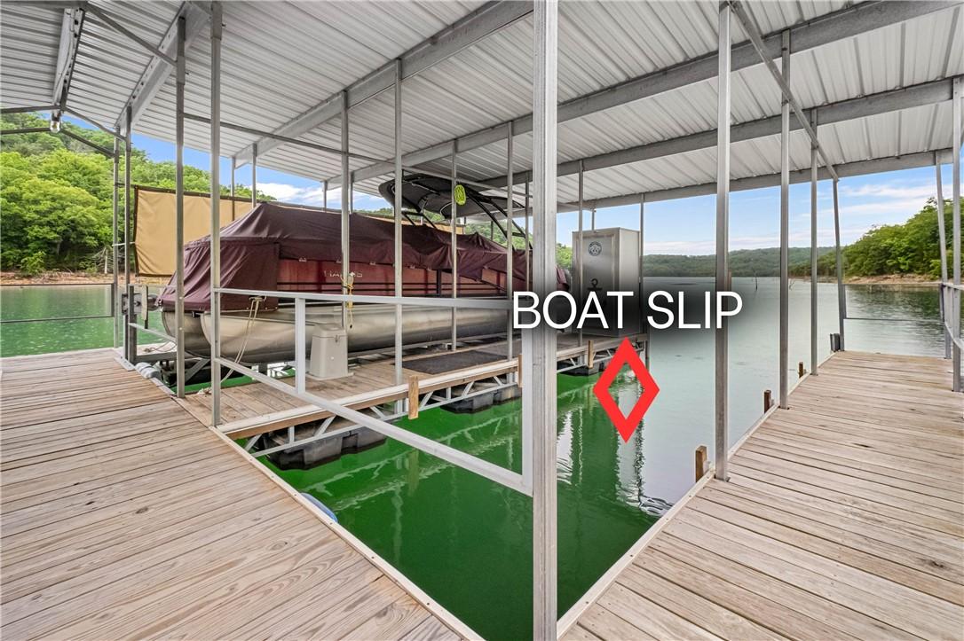 Image 2: 10' x 24' boat slip in 4-slip boat dock conveys wi