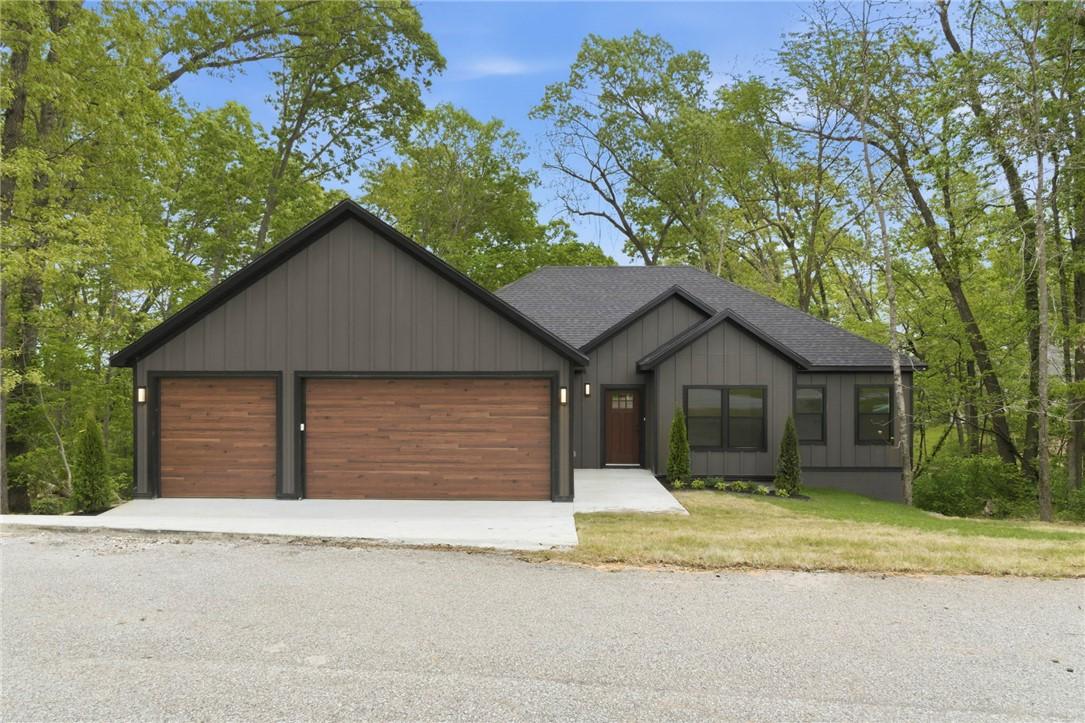 Image 2: Contemporary-style residence featuring a dark gray