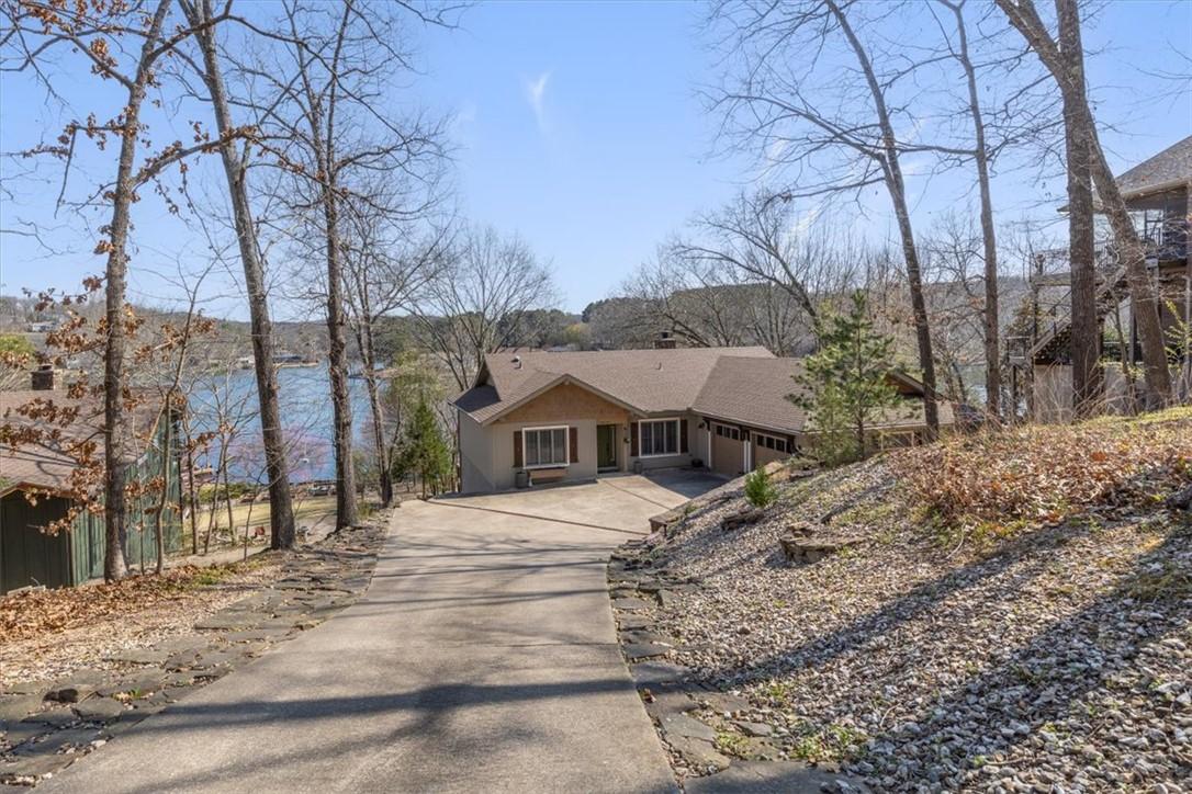 Image 2: View of front of property featuring concrete drive