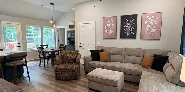 Image 3: Wood-finish flooring throughout, vaulted ceiling,