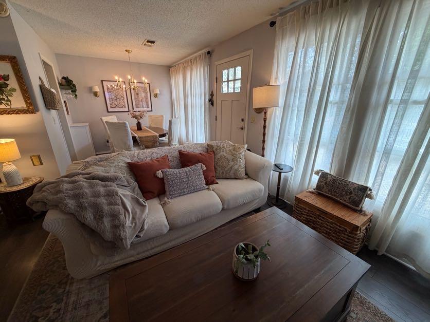 Image 3: Living room featuring wood finished floors, a text