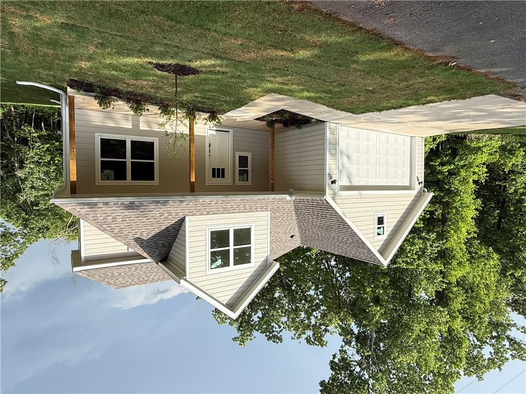 Image 2: Contemporary two-story residence with light-toned