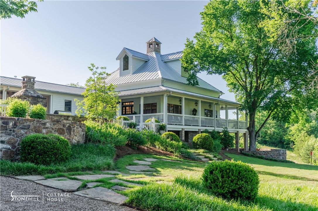 Image 3: In a nod to the original farmhouse that once stood