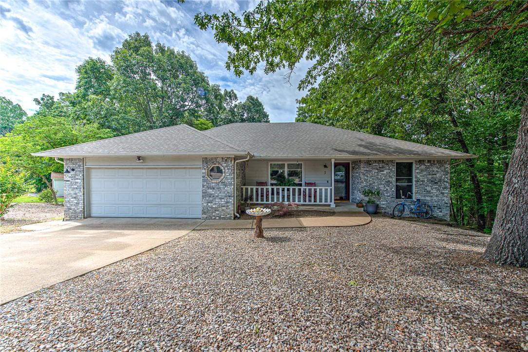 Image 1: Ranch-style residence featuring a gray shingle roo