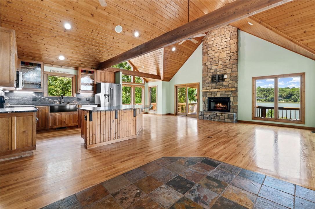 Image 4: Vaulted wood-paneled ceiling with exposed beams, s
