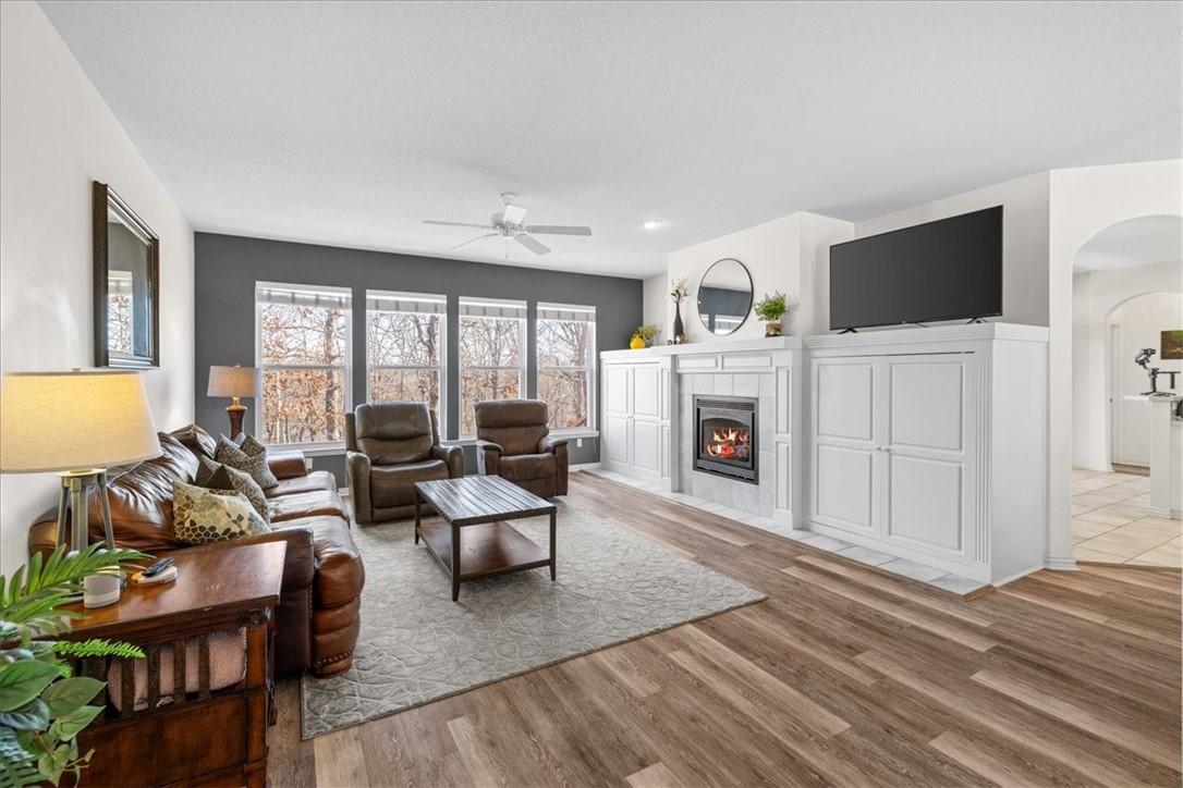 Image 2: As you enter, you are greeted by a spacious living