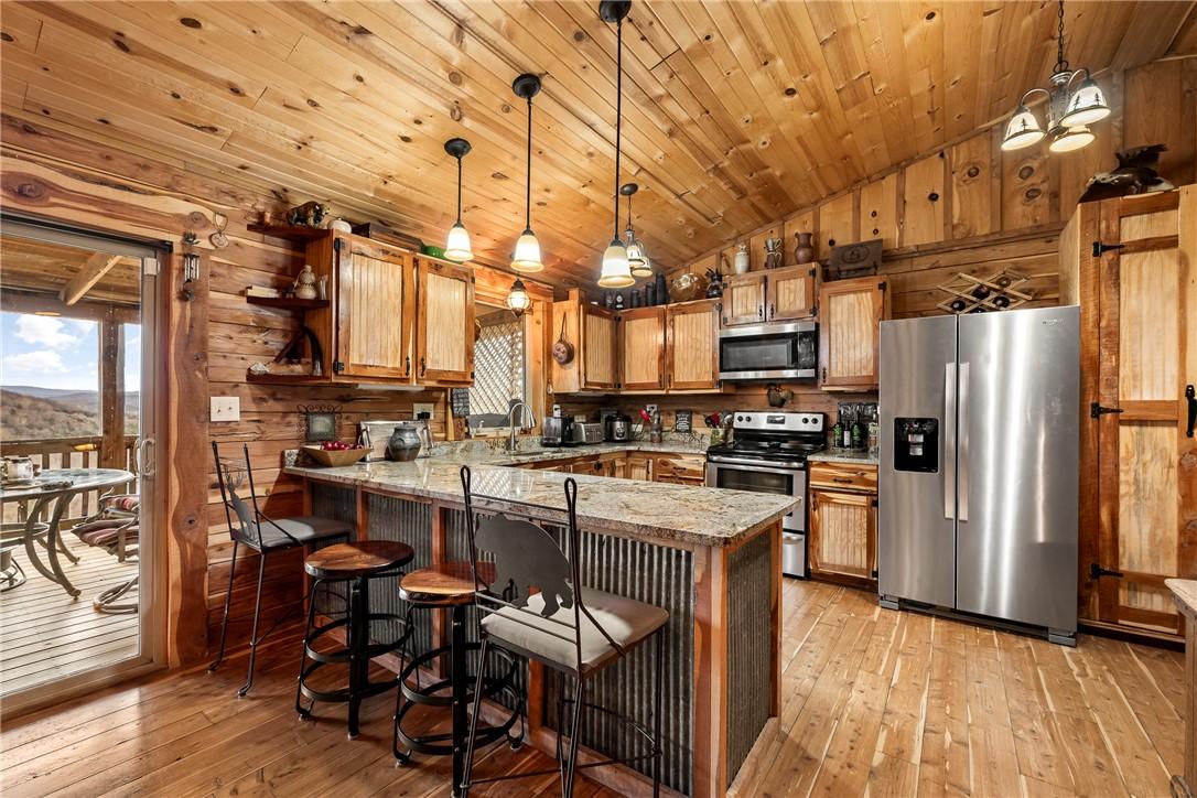 Image 3: Kitchen featuring stainless steel appliances, deco