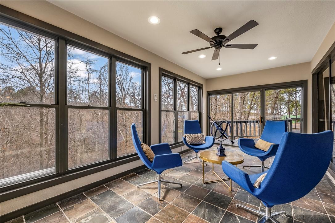 Image 2: Sunroom / solarium featuring stone tile floors and