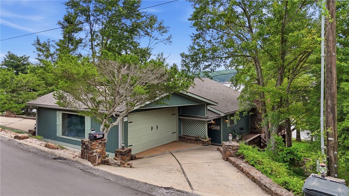 Image 4: This garage features two garage doors-one for entr