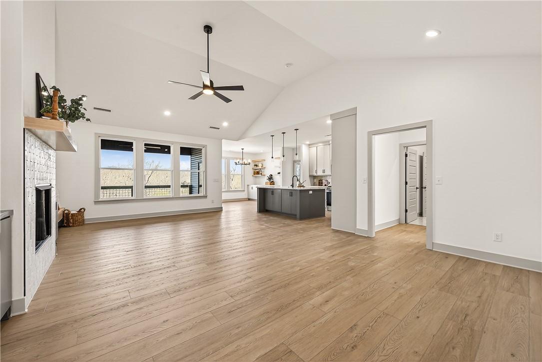 Image 4: Living room & Kitchen featuring a ceiling fan, a f